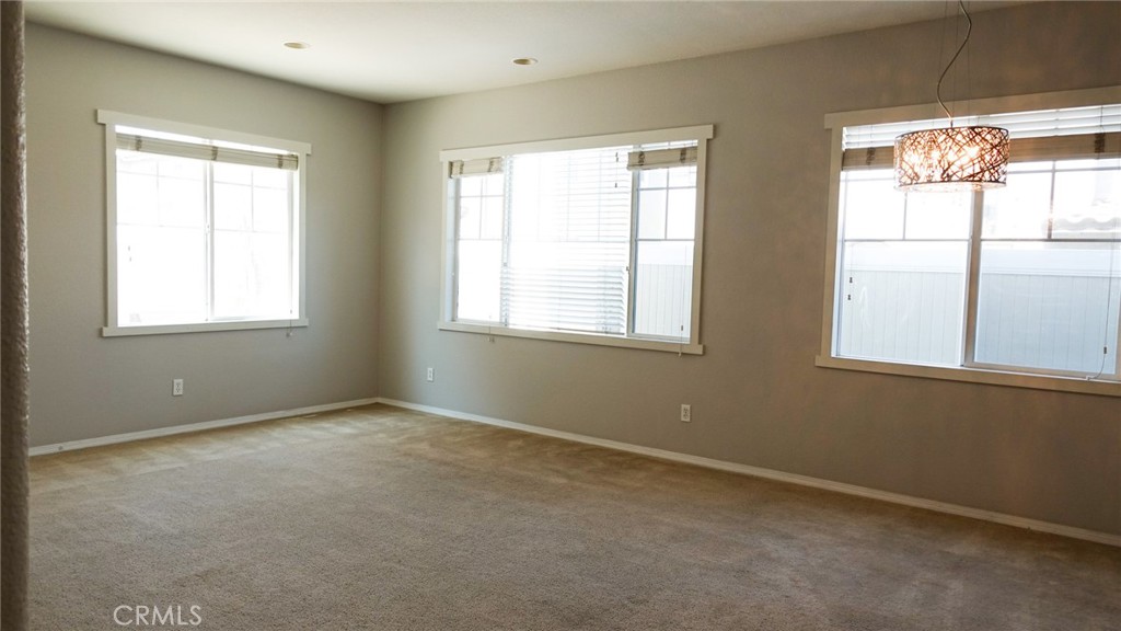 33953 Lily Road Yucaipa, CA 92399 - Photo 7 of 38 an empty room with a window