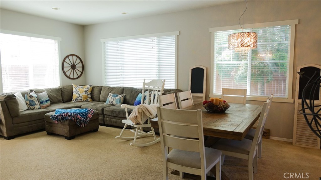 33953 Lily Road Yucaipa, CA 92399 - Photo 9 of 38 a living room with furniture and a window