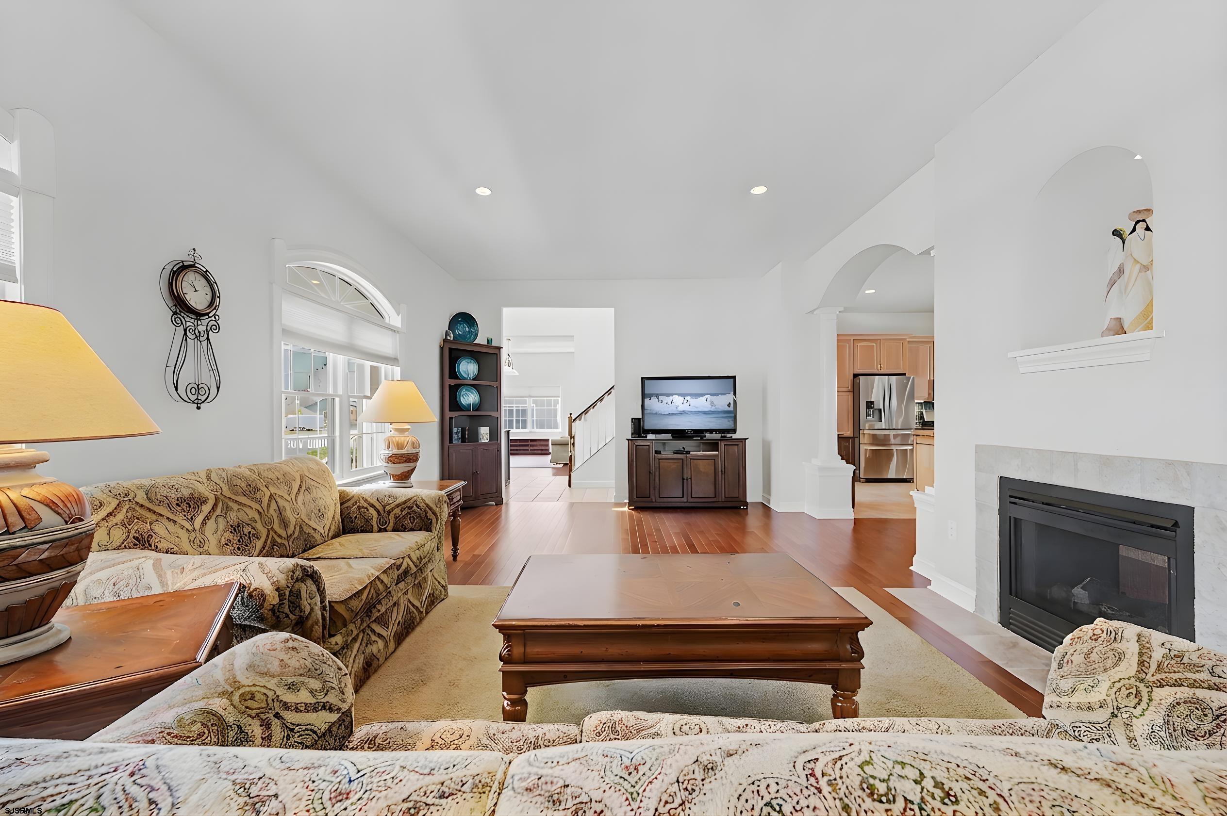 212 17th Street South Brigantine, NJ 08203 - Photo 18 of 37 a living room with furniture and a fireplace