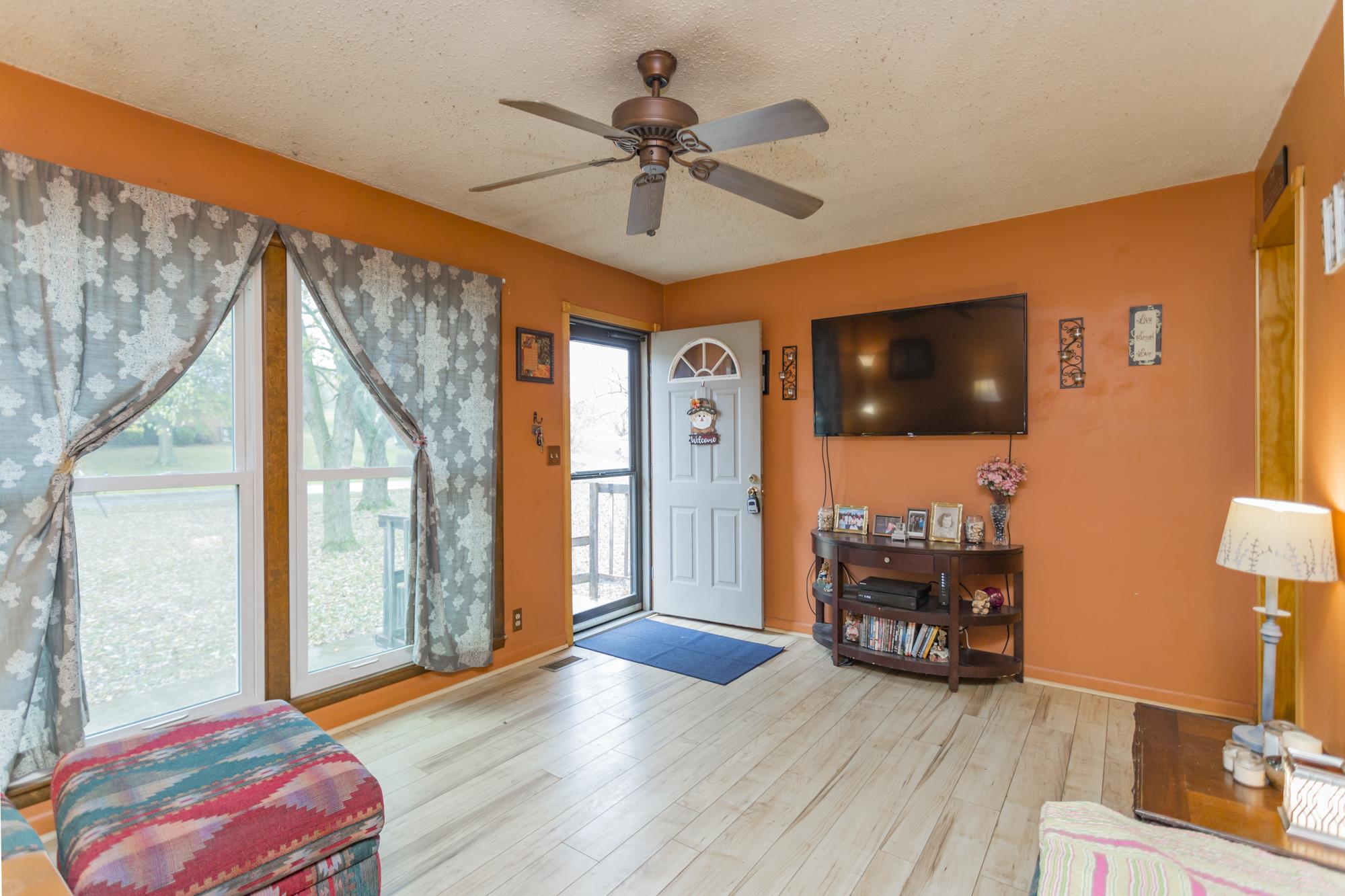 104 Valley Drive Springfield, TN 37172 - Photo 1 of 13 The living room has a new picture window, laminate floor, and only needs your personal touch!