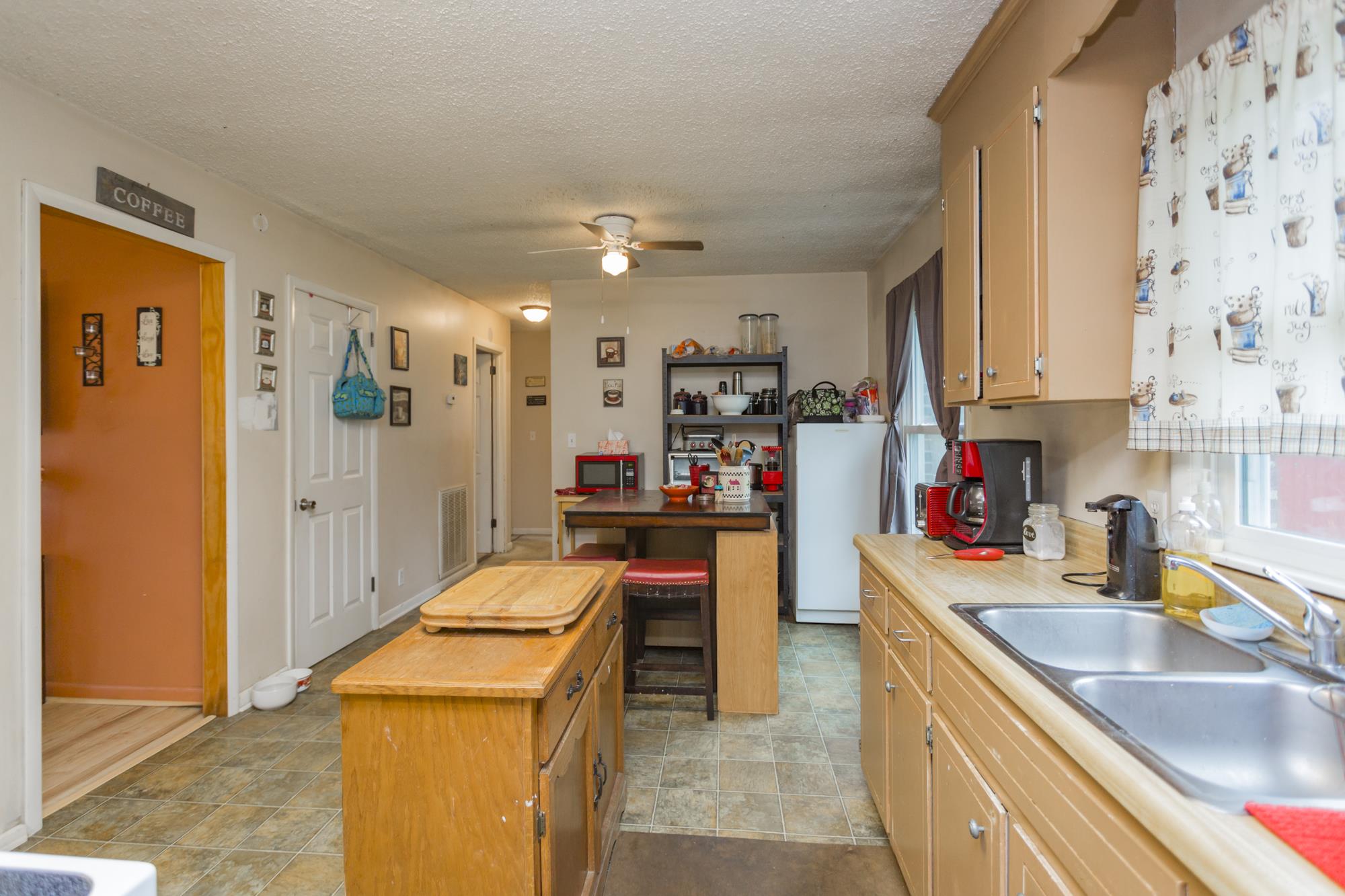104 Valley Drive Springfield, TN 37172 - Photo 3 of 13 The dining area has a large window for lots of natural light and a pantry closet!