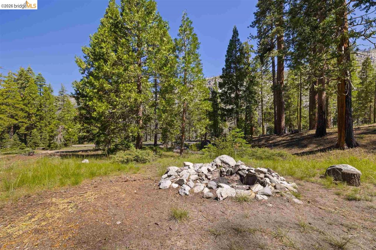 7 Riverside Tract Kyburz, CA 95720 - Photo 24 of 25 a view of a lake with a yard