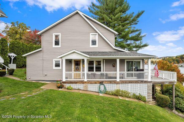 338 Point Road Factoryville, PA 18419 - Photo 3 of 55 a front view of a house with a yard