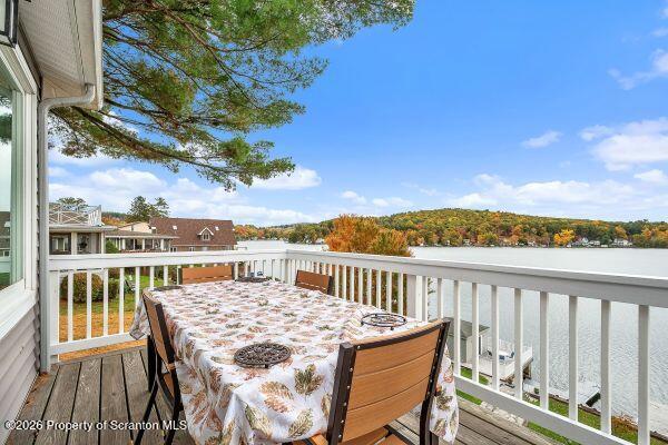 338 Point Road Factoryville, PA 18419 - Photo 33 of 55 a view of a balcony with mountain view and wooden floor