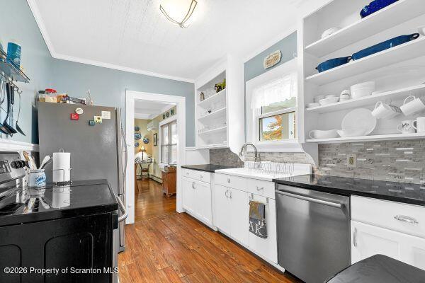 338 Point Road Factoryville, PA 18419 - Photo 35 of 55 a kitchen with stainless steel appliances granite countertop a sink and cabinets