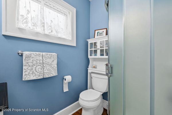 338 Point Road Factoryville, PA 18419 - Photo 38 of 55 a white toilet sitting next to a bathroom sink and tub
