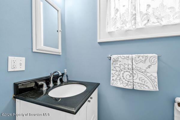 338 Point Road Factoryville, PA 18419 - Photo 39 of 55 a bathroom with a sink and a mirror