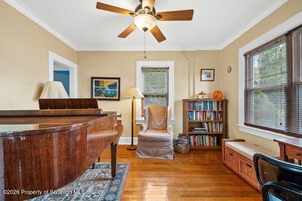 338 Point Road Factoryville, PA 18419 - Photo 40 of 55 a living room with furniture a bookshelf and a window