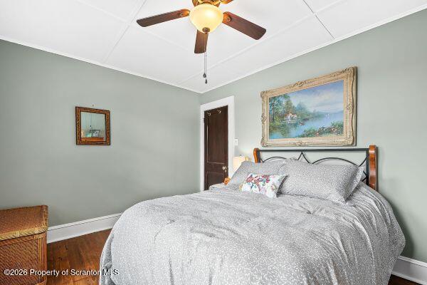 338 Point Road Factoryville, PA 18419 - Photo 44 of 55 a bedroom with a large bed and a chandelier