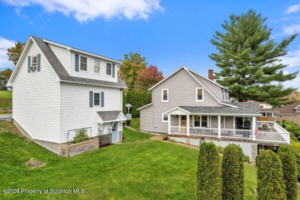 338 Point Road Factoryville, PA 18419 - Photo 5 of 55 a front view of a house with a yard