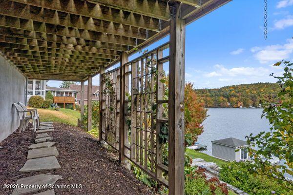 338 Point Road Factoryville, PA 18419 - Photo 9 of 55 a view of a porch with furniture and a yard