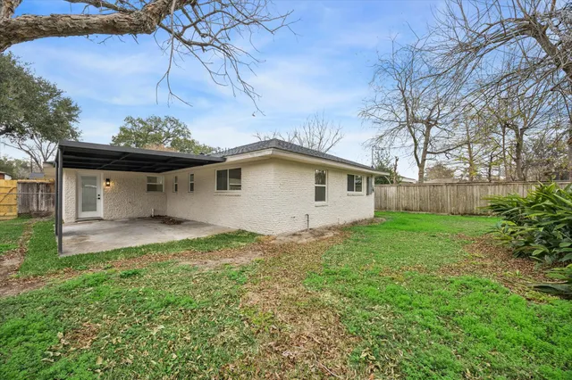 a view of a backyard with a garden