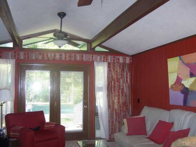6905 Hillside Court Raleigh, NC 27607 - Photo 7 of 10 Family Room with Vaulted ceilings and 2 fans Other