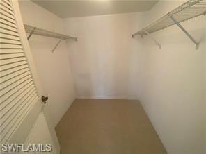 705 Augusta Boulevard, Unit 7055 Naples, FL 34113 - Photo 11 of 18 a view of small space with racks on the wall