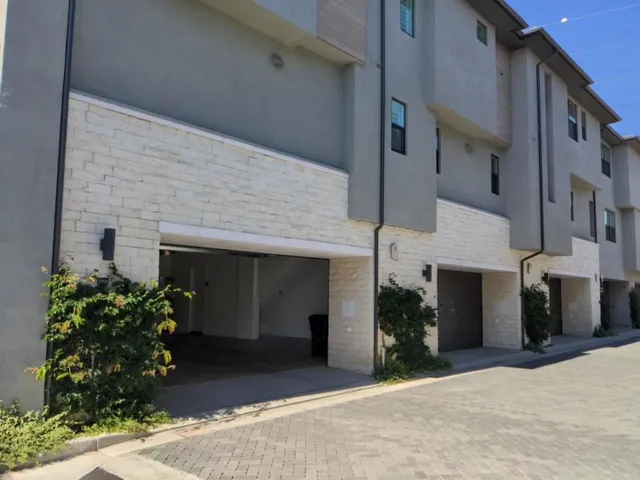 a front view of a house with yard