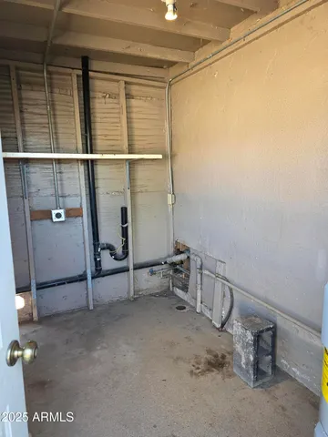 a view of a room with racks on the wall