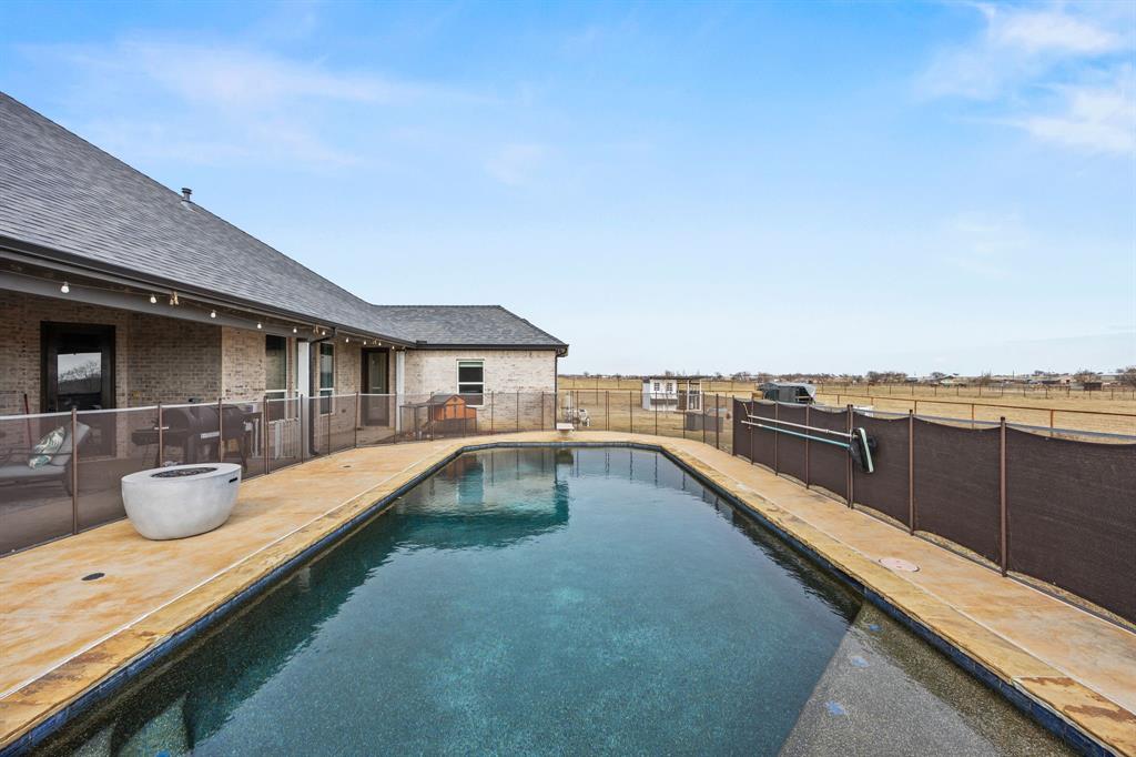 13688 Jackson Road Ponder, TX 76259 - Photo 18 of 20 a view of a patio with swimming pool table and chairs