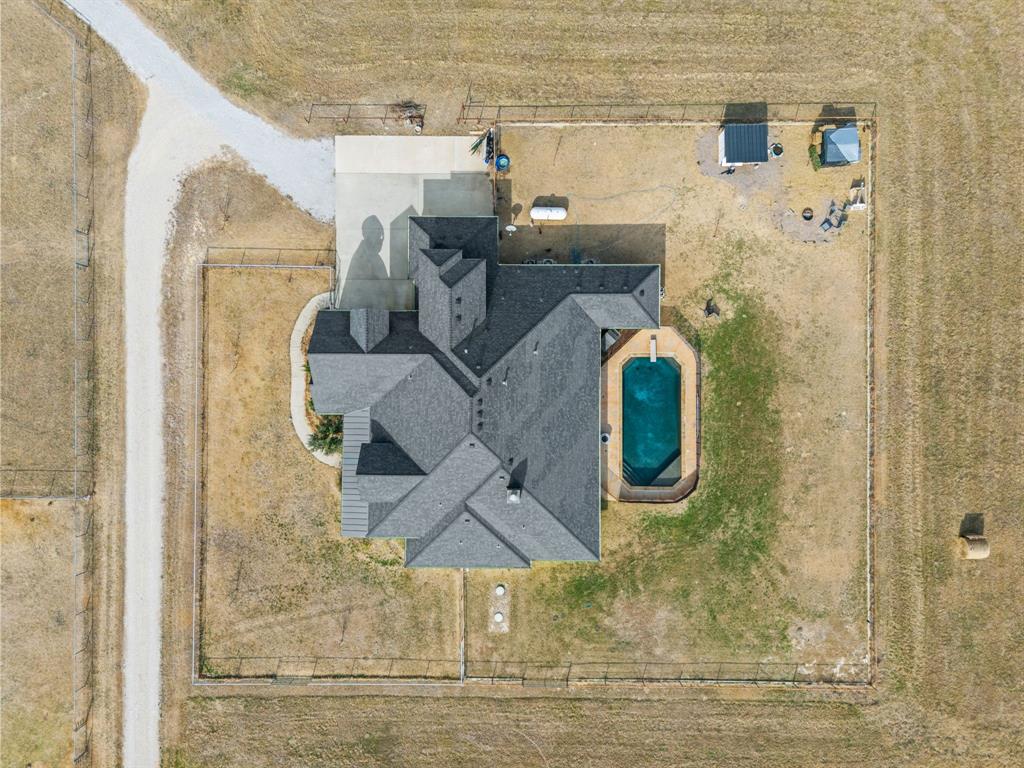 13688 Jackson Road Ponder, TX 76259 - Photo 2 of 20 a bathroom with a sink and mirror