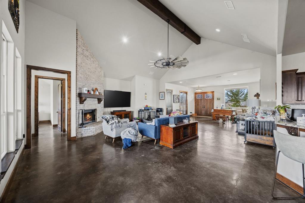 13688 Jackson Road Ponder, TX 76259 - Photo 4 of 20 a living room with furniture and a flat screen tv