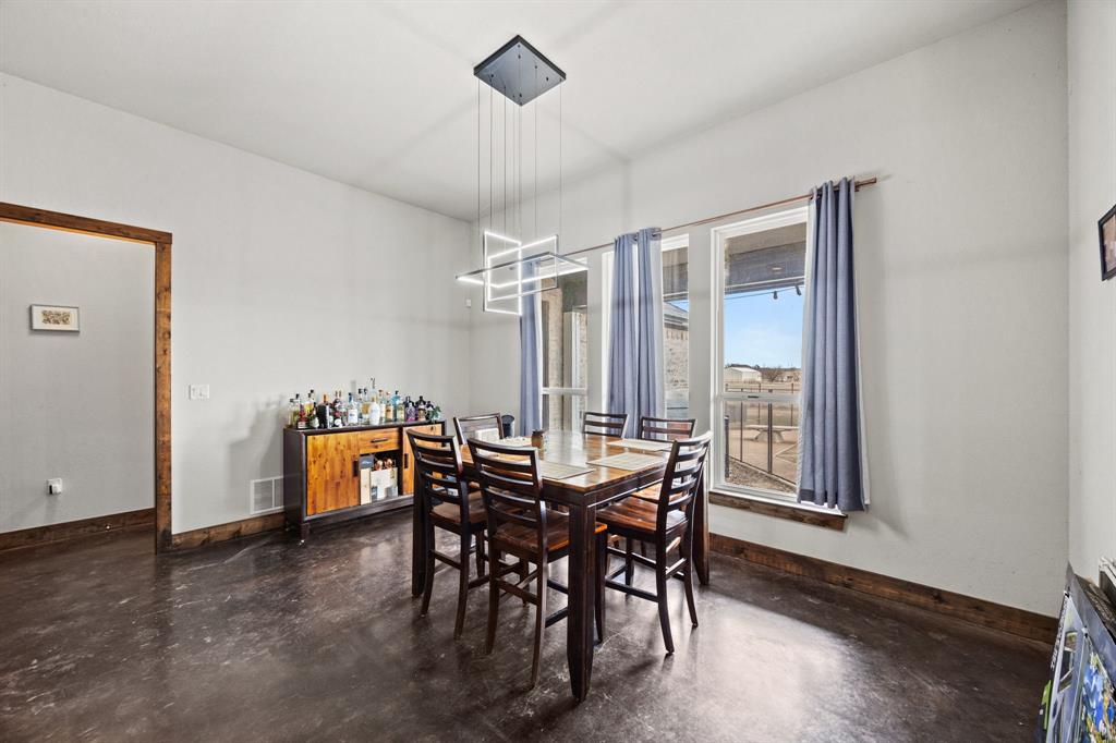 13688 Jackson Road Ponder, TX 76259 - Photo 9 of 20 a view of a dining room with furniture and window