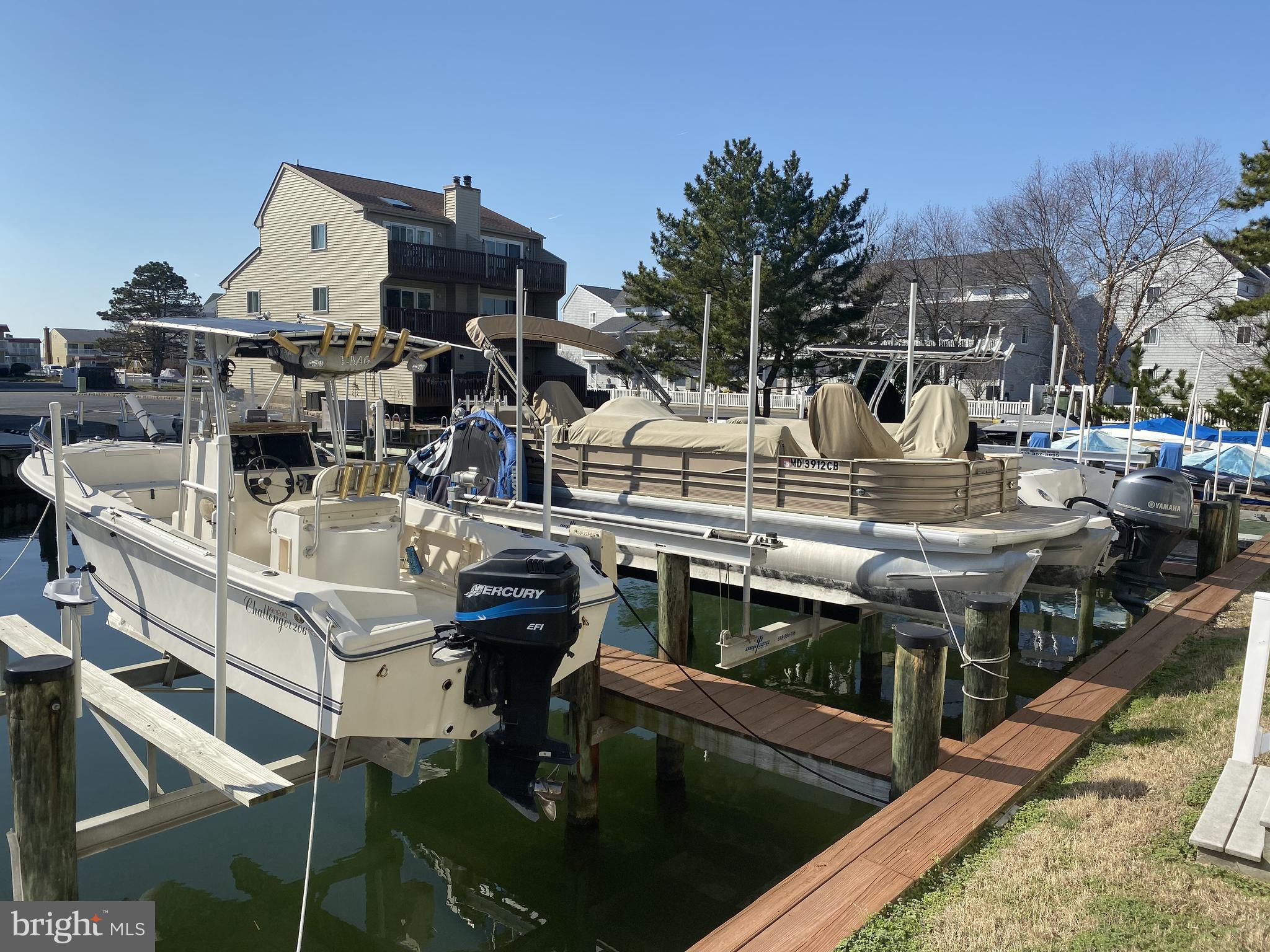 617 Salt Spray Road, Unit 6 Ocean City, MD 21842 - Photo 10 of 43 Boat Dock with Boat Lift
