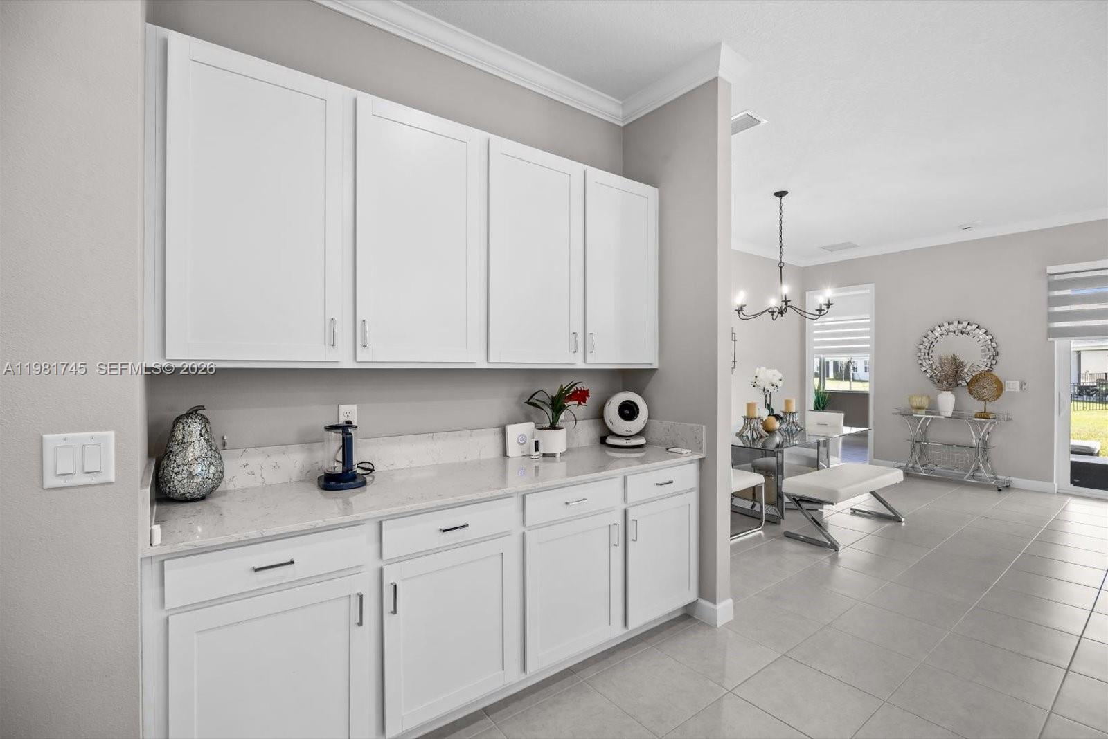 1204 Southeast Woodbine Road Port St. Lucie, FL 34984 - Photo 13 of 46 a view of living room with furniture and window