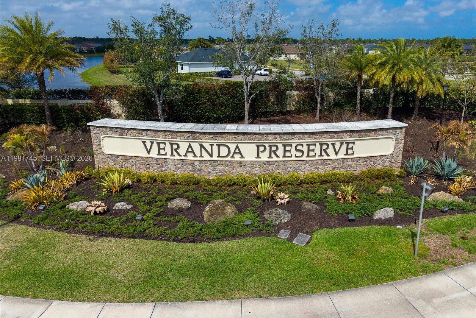 1204 Southeast Woodbine Road Port St. Lucie, FL 34984 - Photo 46 of 46 a sign on the side of the road