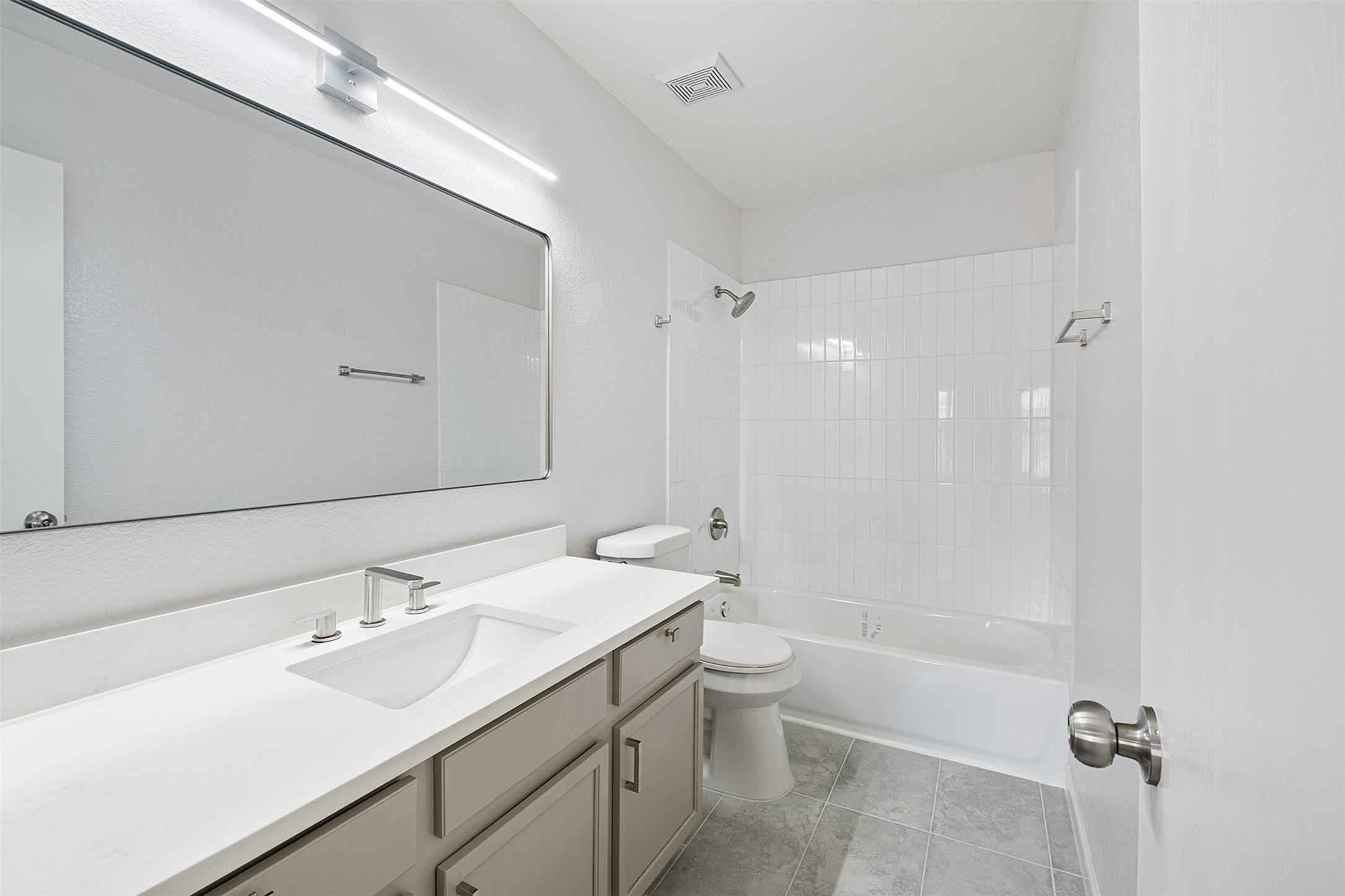 2101 Bridal Path Cedar Park, TX 78613 - Photo 24 of 38 a bathroom with a sink a toilet and shower