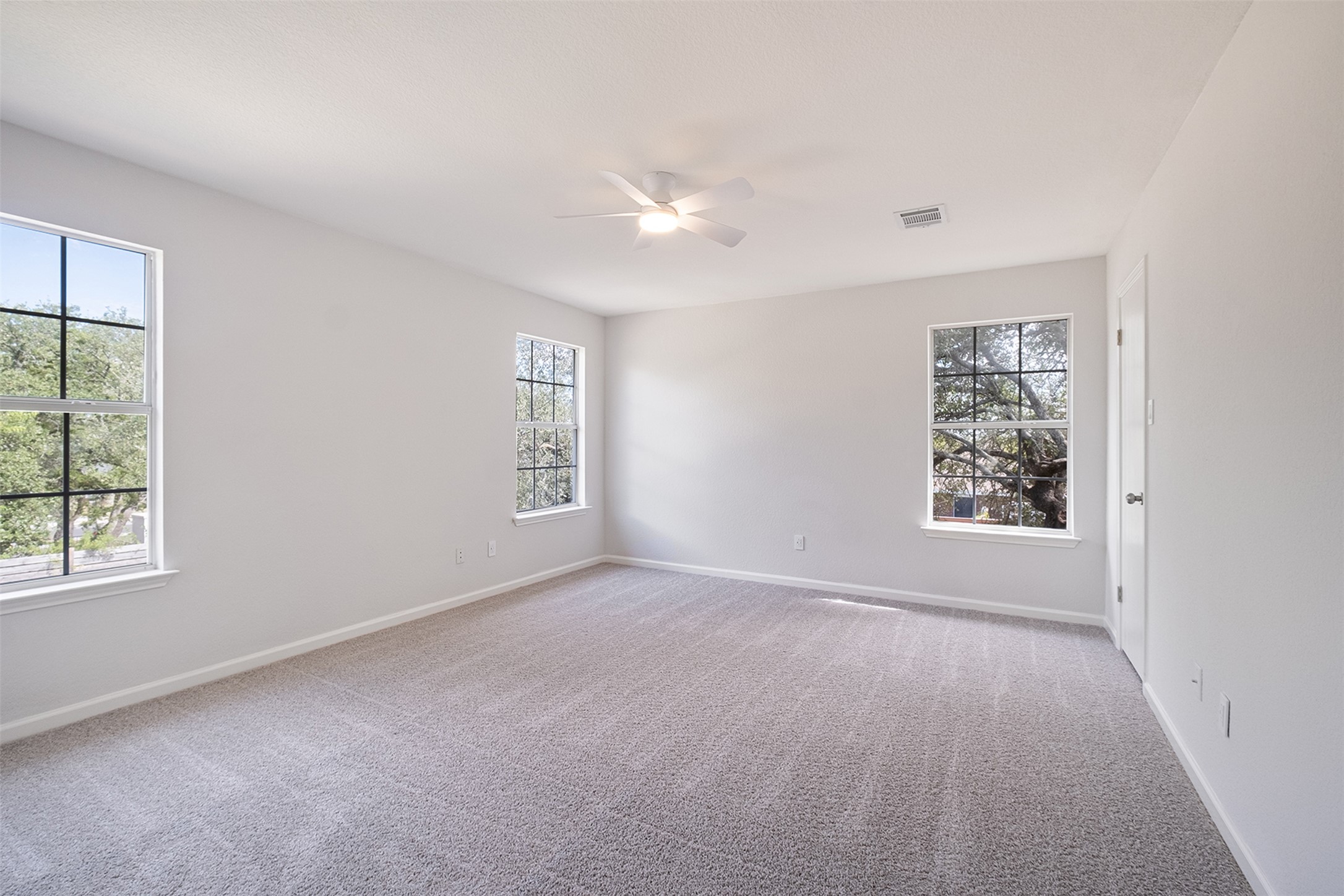 2101 Bridal Path Cedar Park, TX 78613 - Photo 25 of 38 an empty room with windows and closet