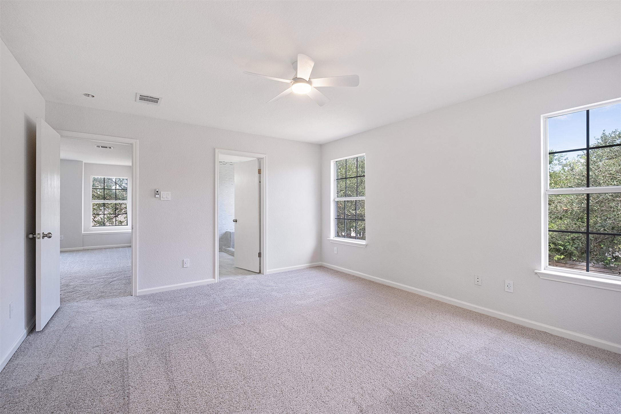 2101 Bridal Path Cedar Park, TX 78613 - Photo 26 of 38 an empty room with windows and closet