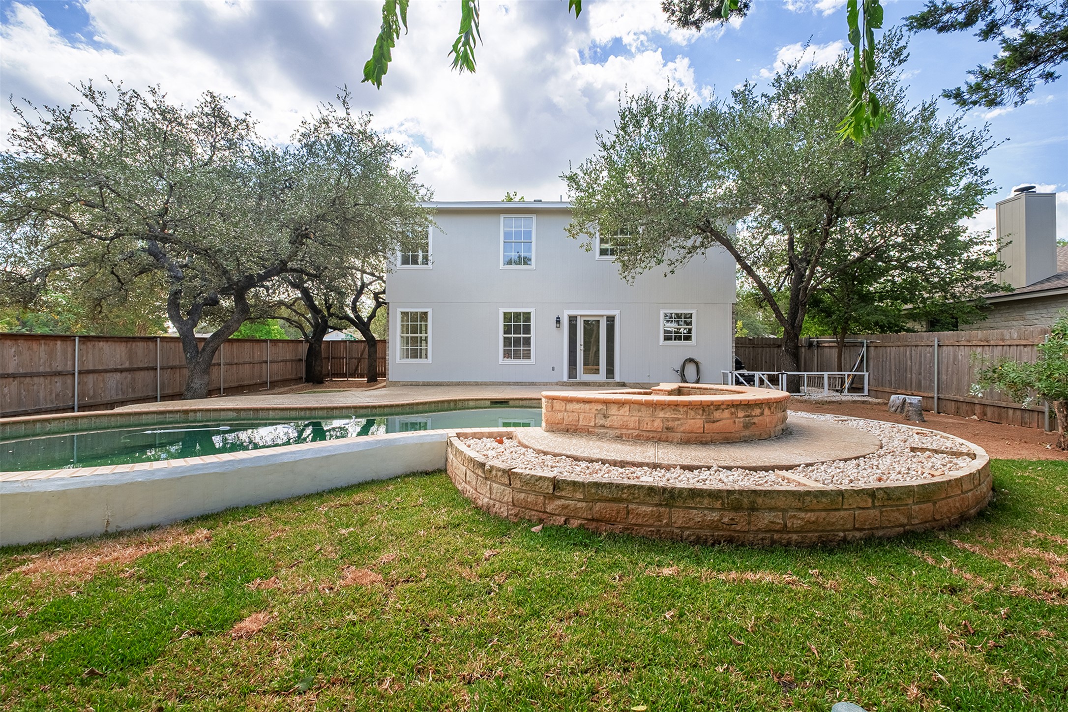 2101 Bridal Path Cedar Park, TX 78613 - Photo 33 of 38 a front view of a house with a garden