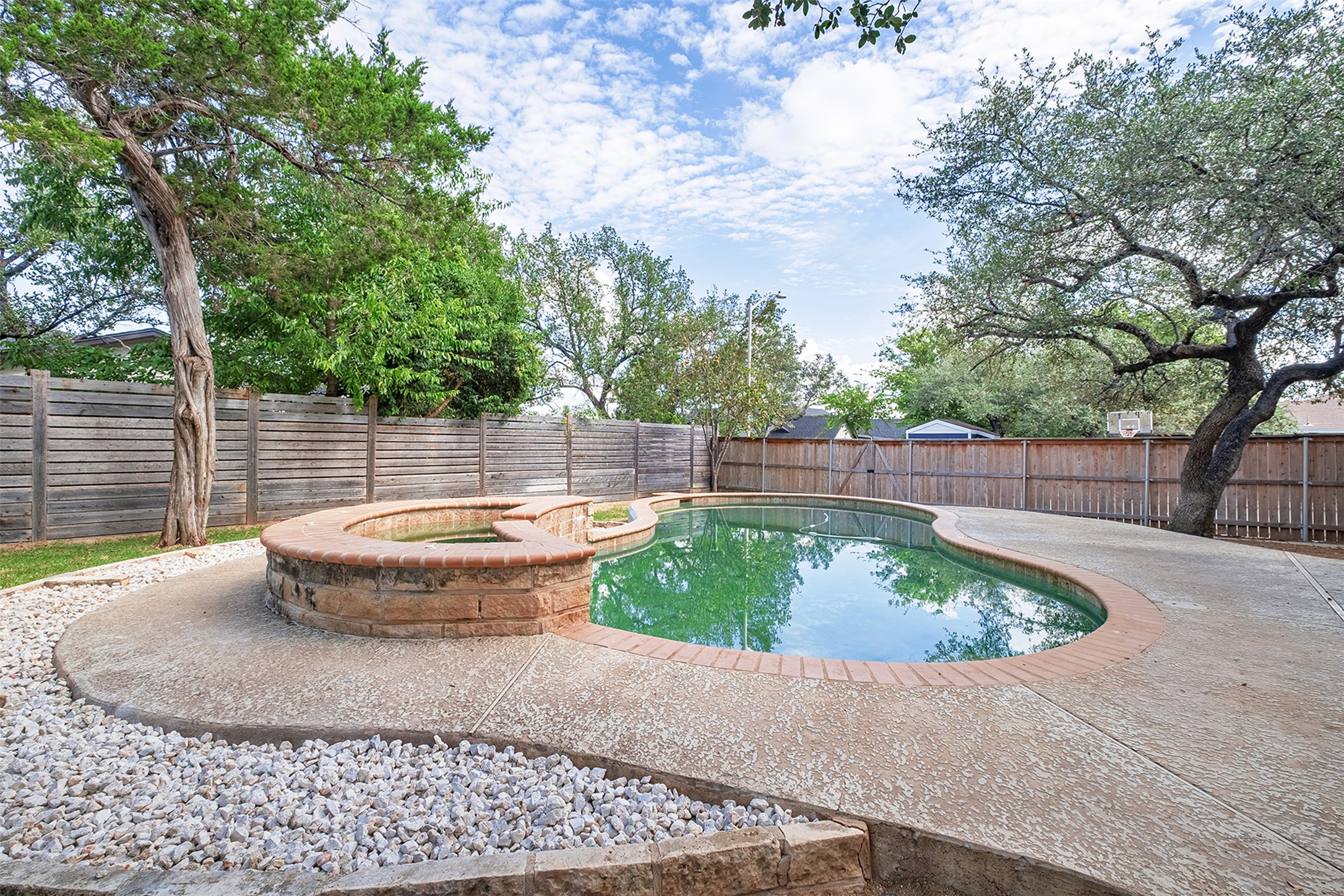 2101 Bridal Path Cedar Park, TX 78613 - Photo 36 of 38 a view of a backyard with plants and tree
