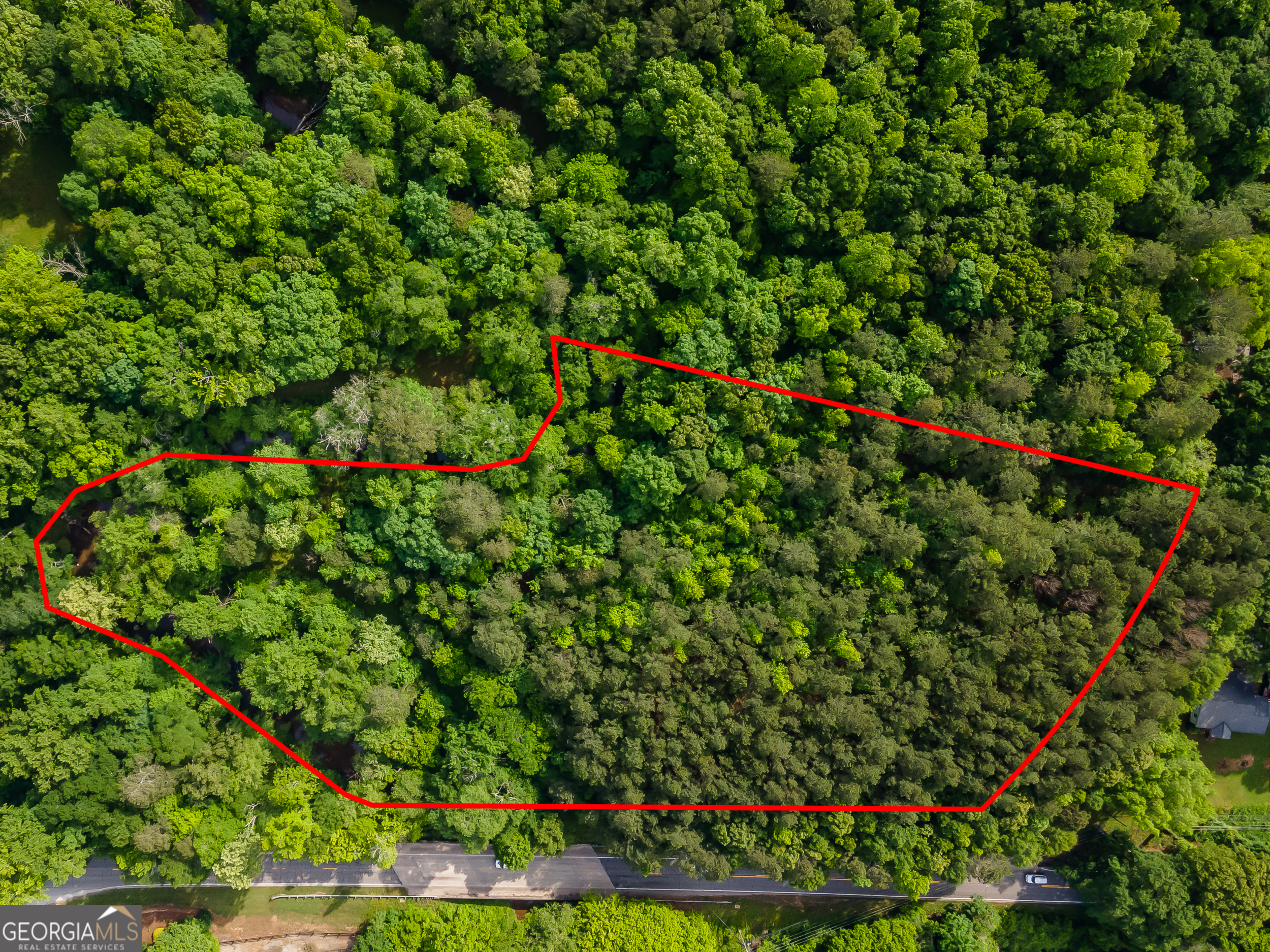 4.5-ac Hickory Flat Road Woodstock, GA 30188 - Photo 4 of 20 a view of a lush green field