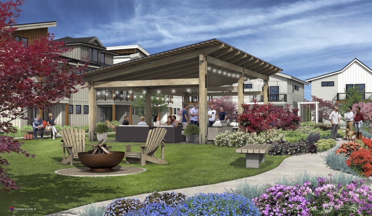 211 Pebblebrook Drive Lynden, WA 98264 - Photo 36 of 36 a front view of a house with a garden and sitting area