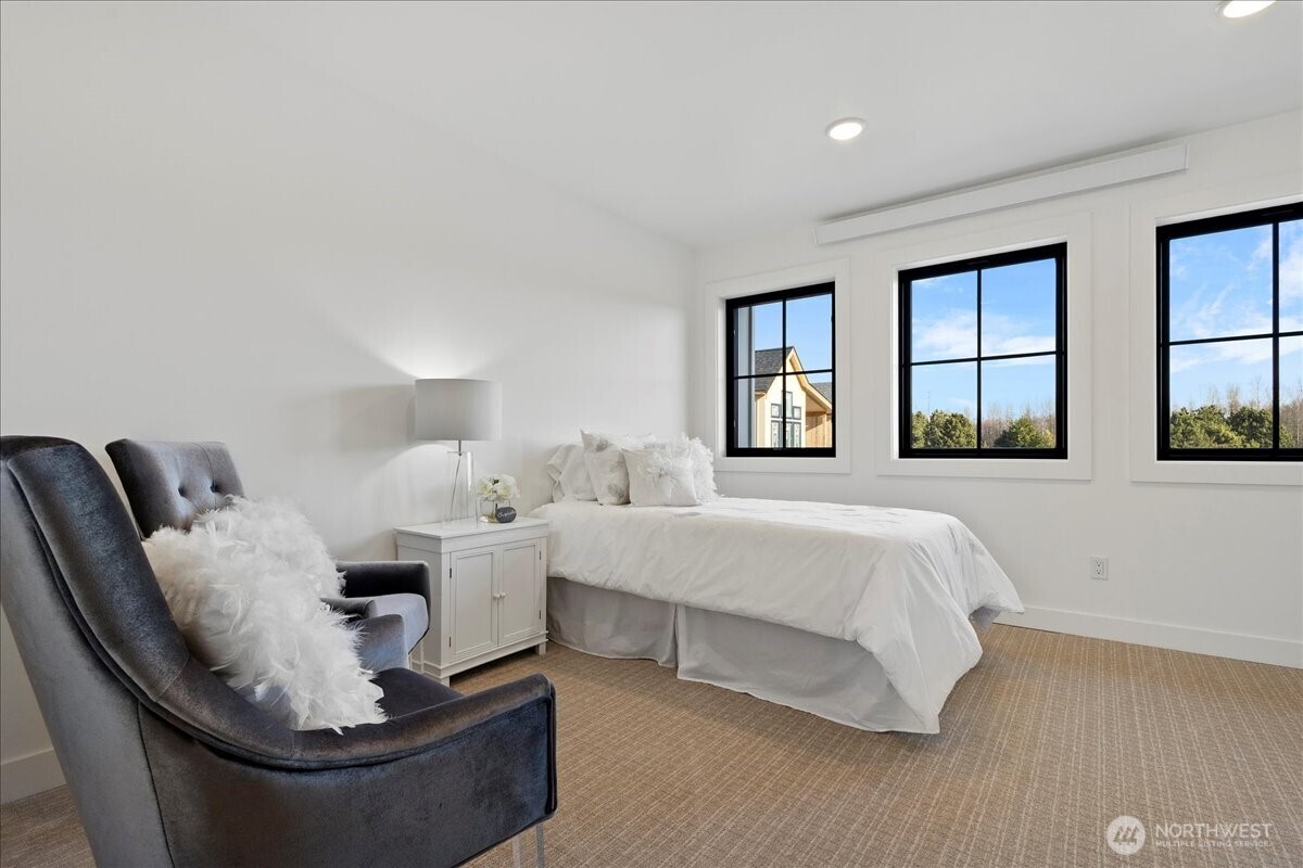 211 Pebblebrook Drive Lynden, WA 98264 - Photo 6 of 36 a bed room with furniture and a window