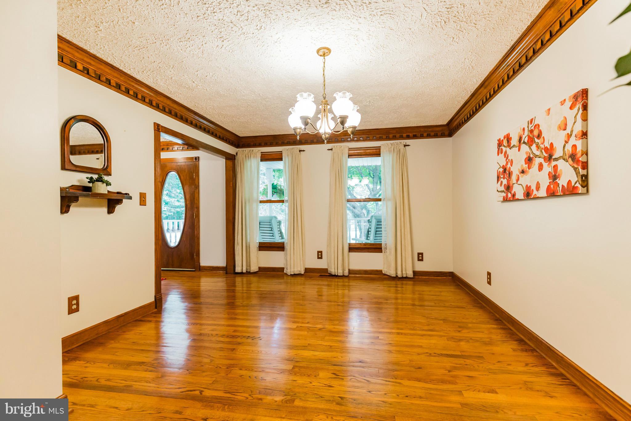 1808 Hatfield Road Huntingtown, MD 20639 - Photo 15 of 30 Dining Room with Hardwood Floors