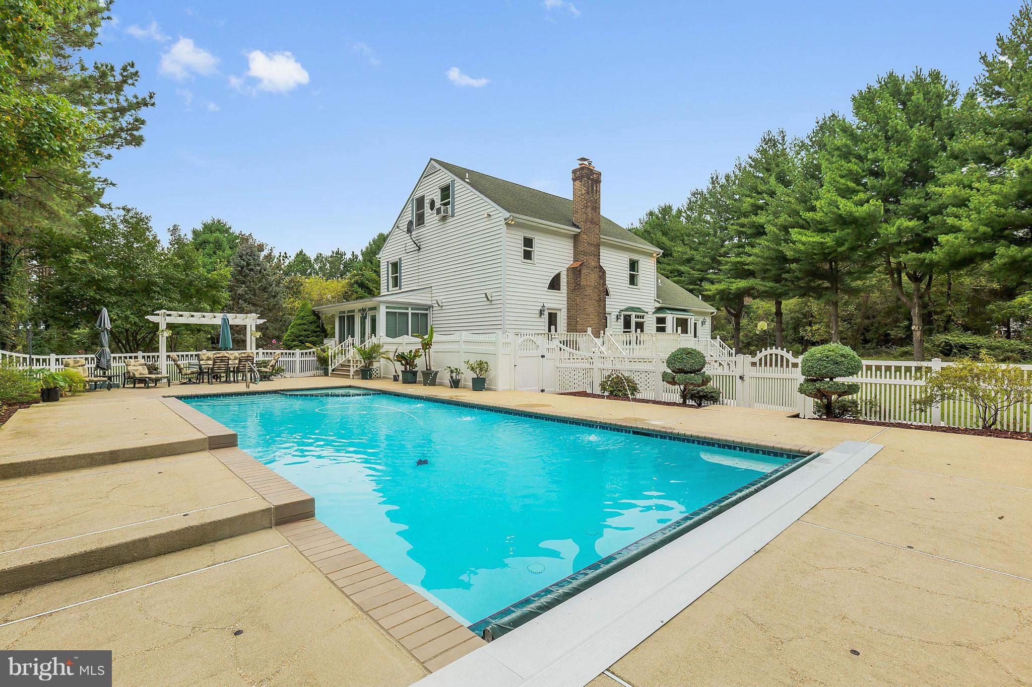 1808 Hatfield Road Huntingtown, MD 20639 - Photo 3 of 30 In-Ground Pool with Waterfall