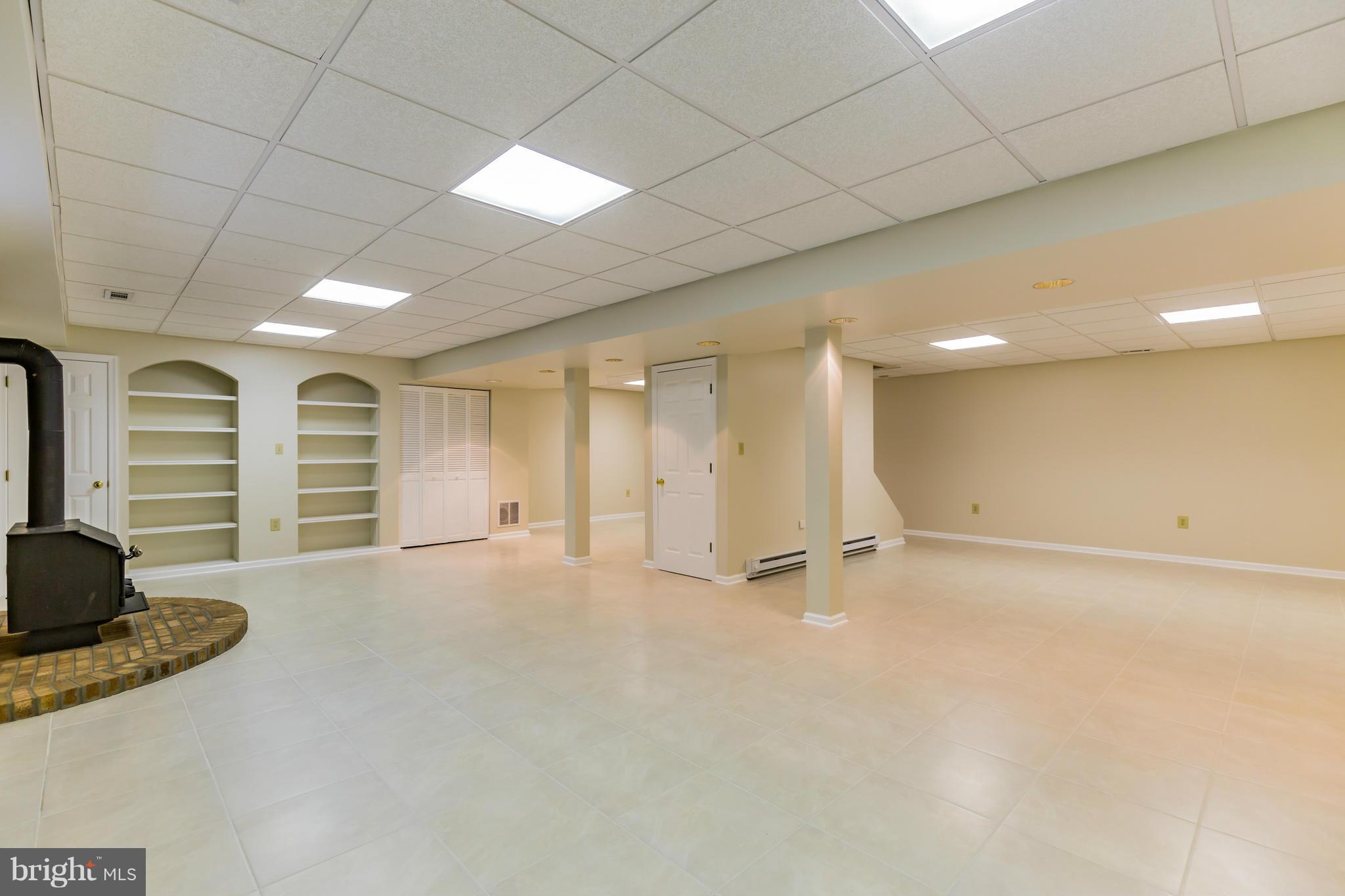 1808 Hatfield Road Huntingtown, MD 20639 - Photo 7 of 30 Fully Finished Lower Level with Ceramic Tile