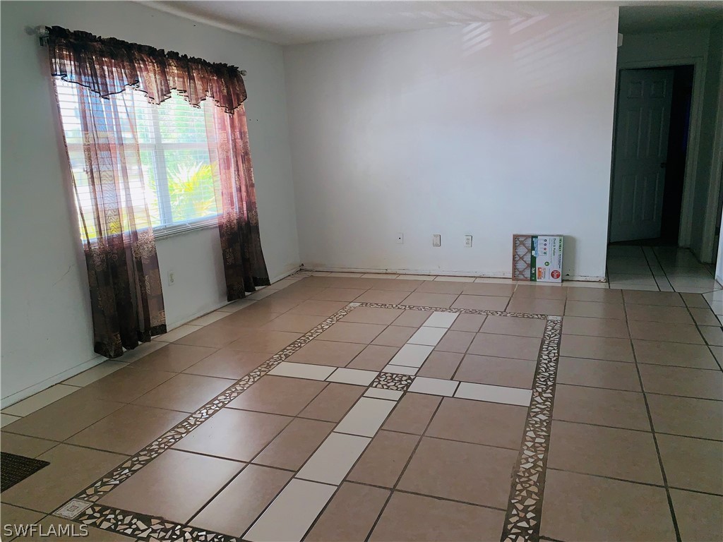 18189 Iris Road Fort Myers, FL 33967 - Photo 9 of 30 a view of an empty room with a window