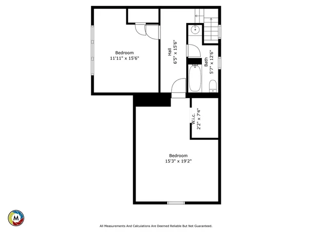 a picture of a bench in front of a wall