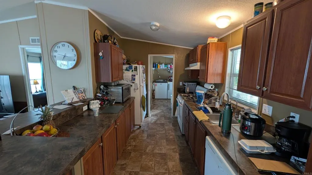 10767 Jamacha Spring Valley, Unit 266 Spring Valley, CA 91978 - Photo 46 of 50 Kitchen - Laundry Room