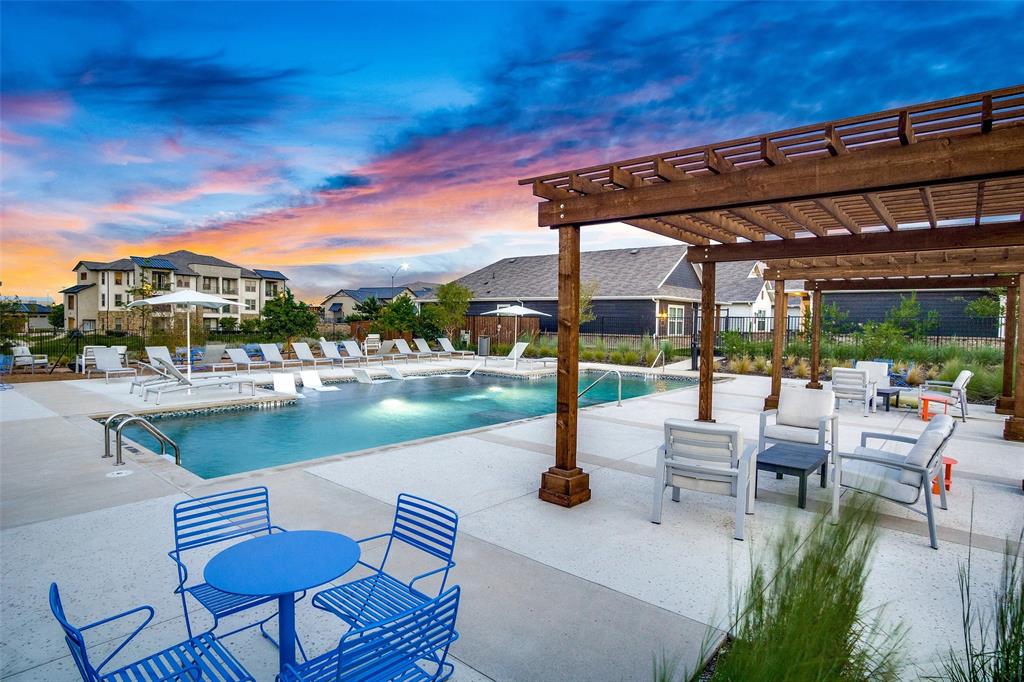 5401 Barlean Ranch, Unit 49R Fort Worth, TX 76123 - Photo 15 of 18 a view of swimming pool with outdoor seating