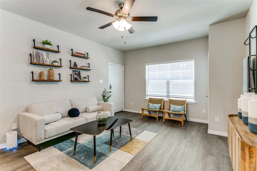 5401 Barlean Ranch, Unit 49R Fort Worth, TX 76123 - Photo 10 of 18 a living room with furniture and a window