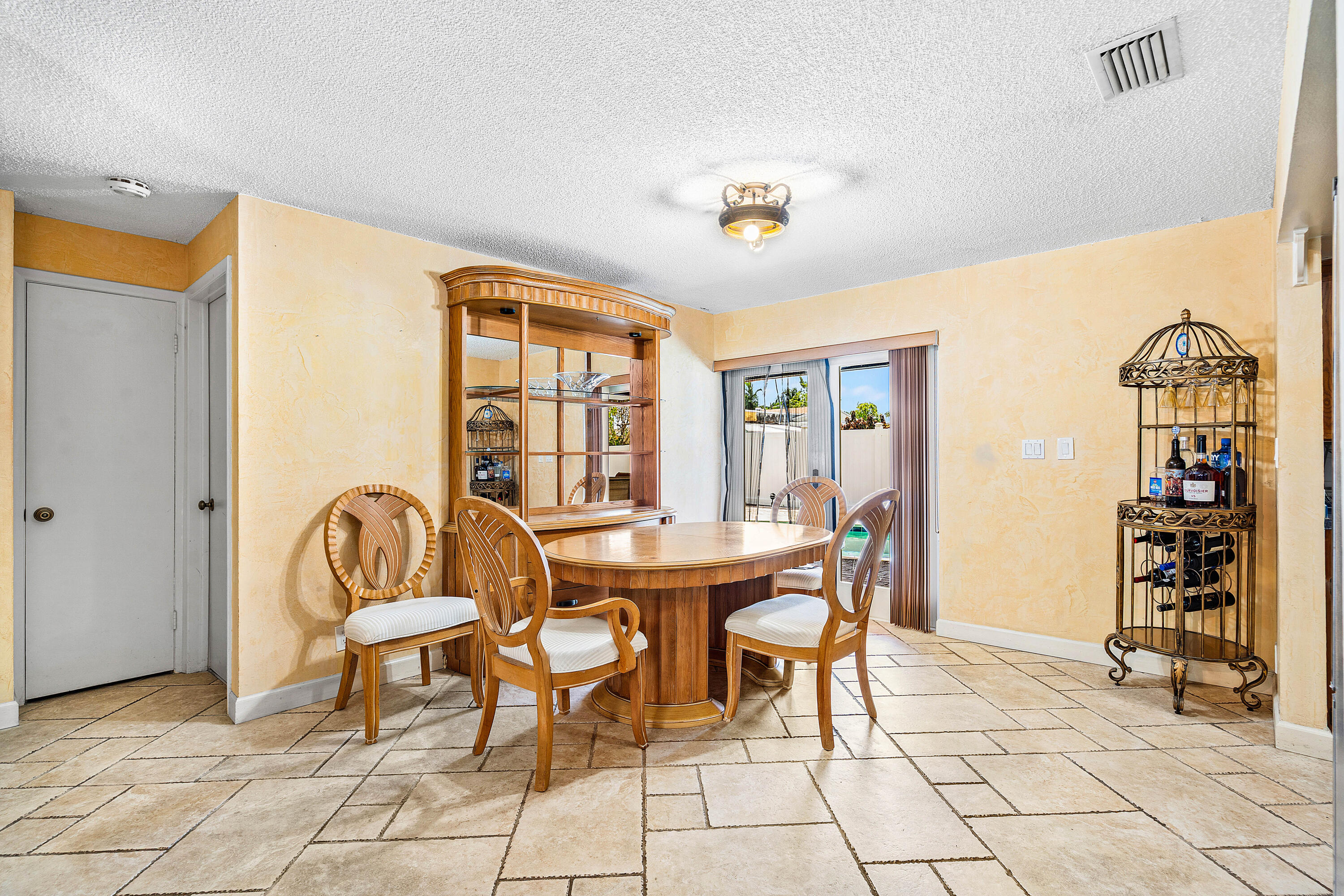 5811 Southwest 53rd Terrace Davie, FL 33314 - Photo 7 of 31 a view of a dining room with furniture and entryway