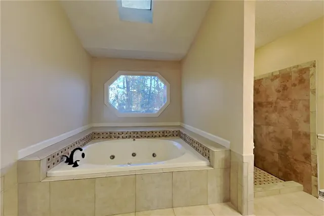 a bathroom with a bathtub
