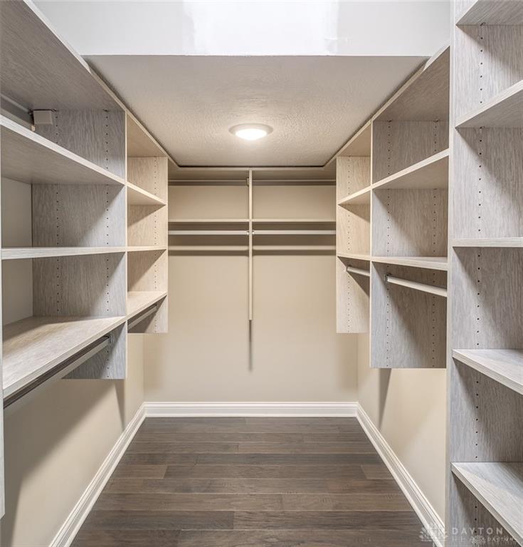 407 Brownstone Row Springboro, OH 45066 - Photo 43 of 54 This spacious closet offers organized storage solutions for your wardrobe.