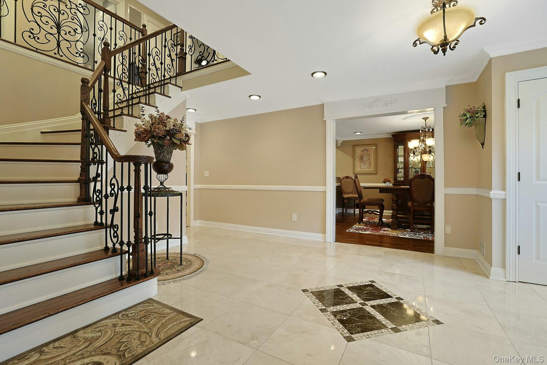 8 Dunmore Road New City, NY 10956 - Photo 8 of 48 a view of a hallway with a couch and chandelier