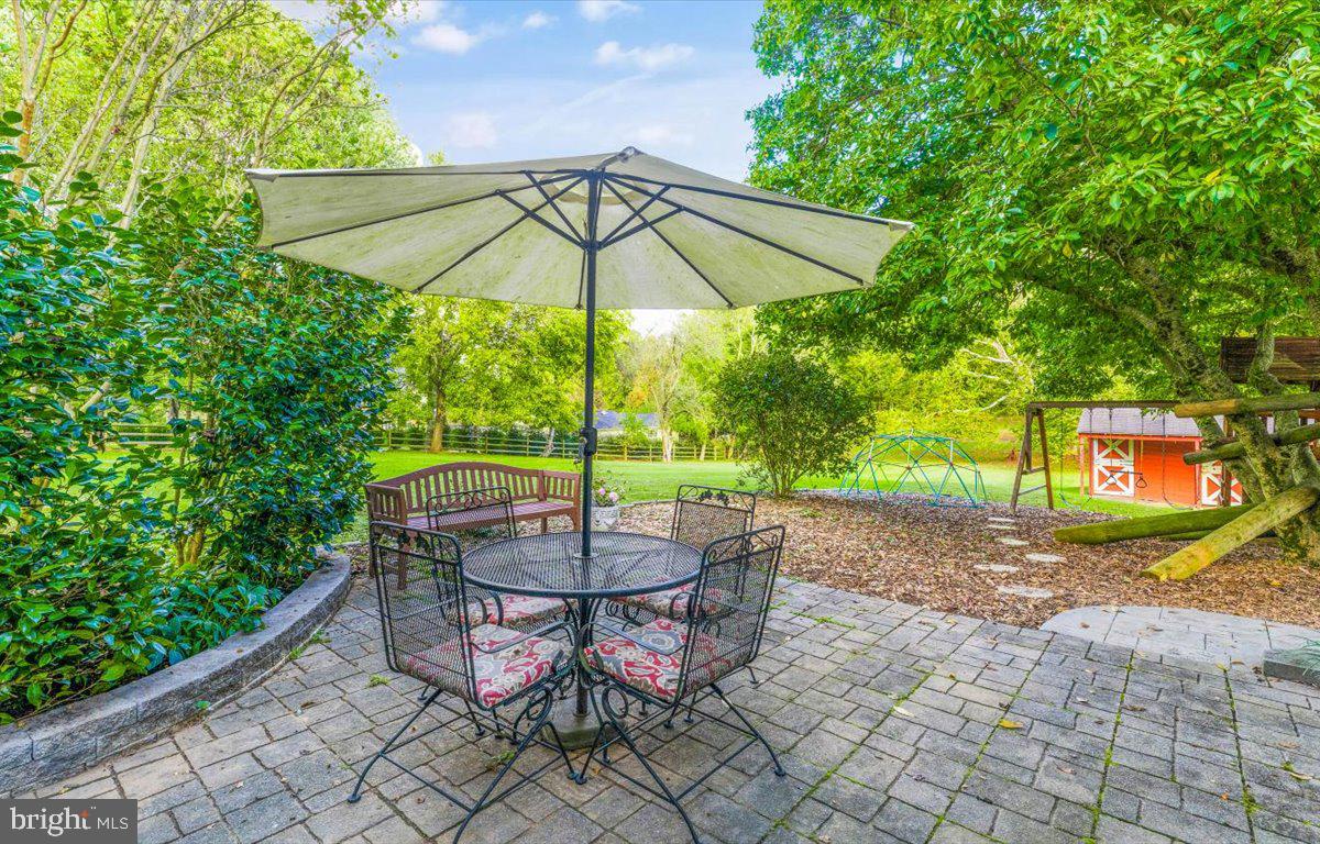23280 Dover Road Middleburg, VA 20117 - Photo 44 of 64 Private patio near children's play area.