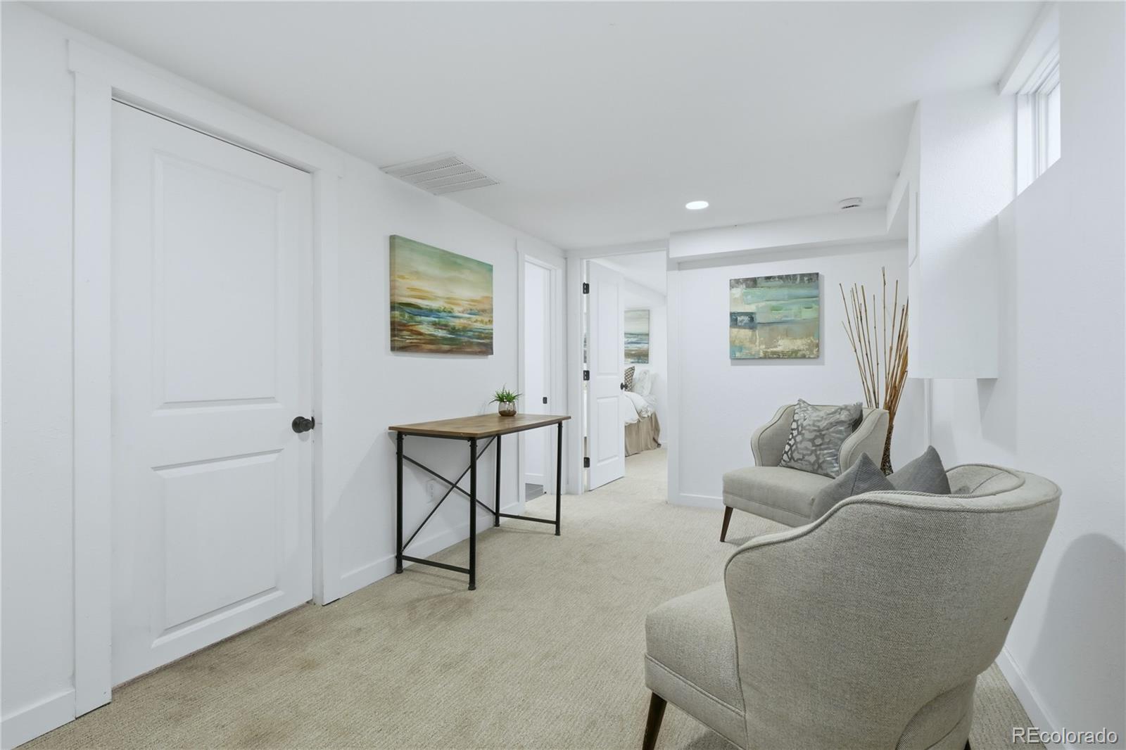 3051 West 37th Avenue Denver, CO 80211 - Photo 25 of 37 a living room with furniture and a window