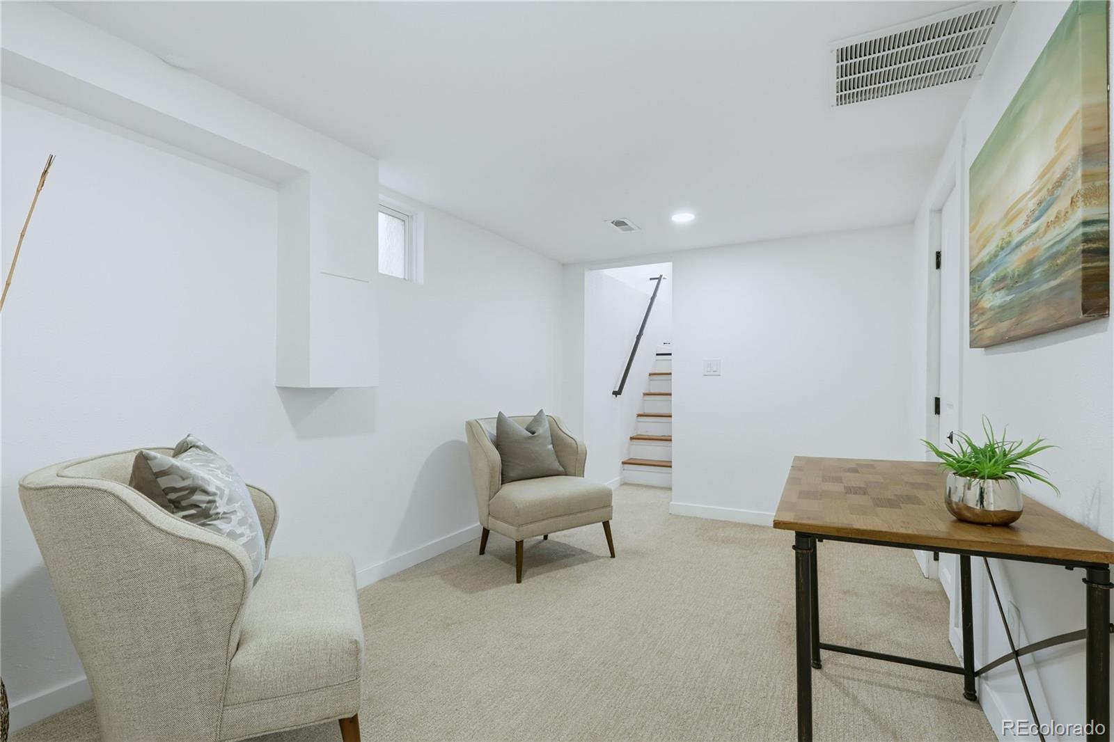 3051 West 37th Avenue Denver, CO 80211 - Photo 26 of 37 a living room with furniture